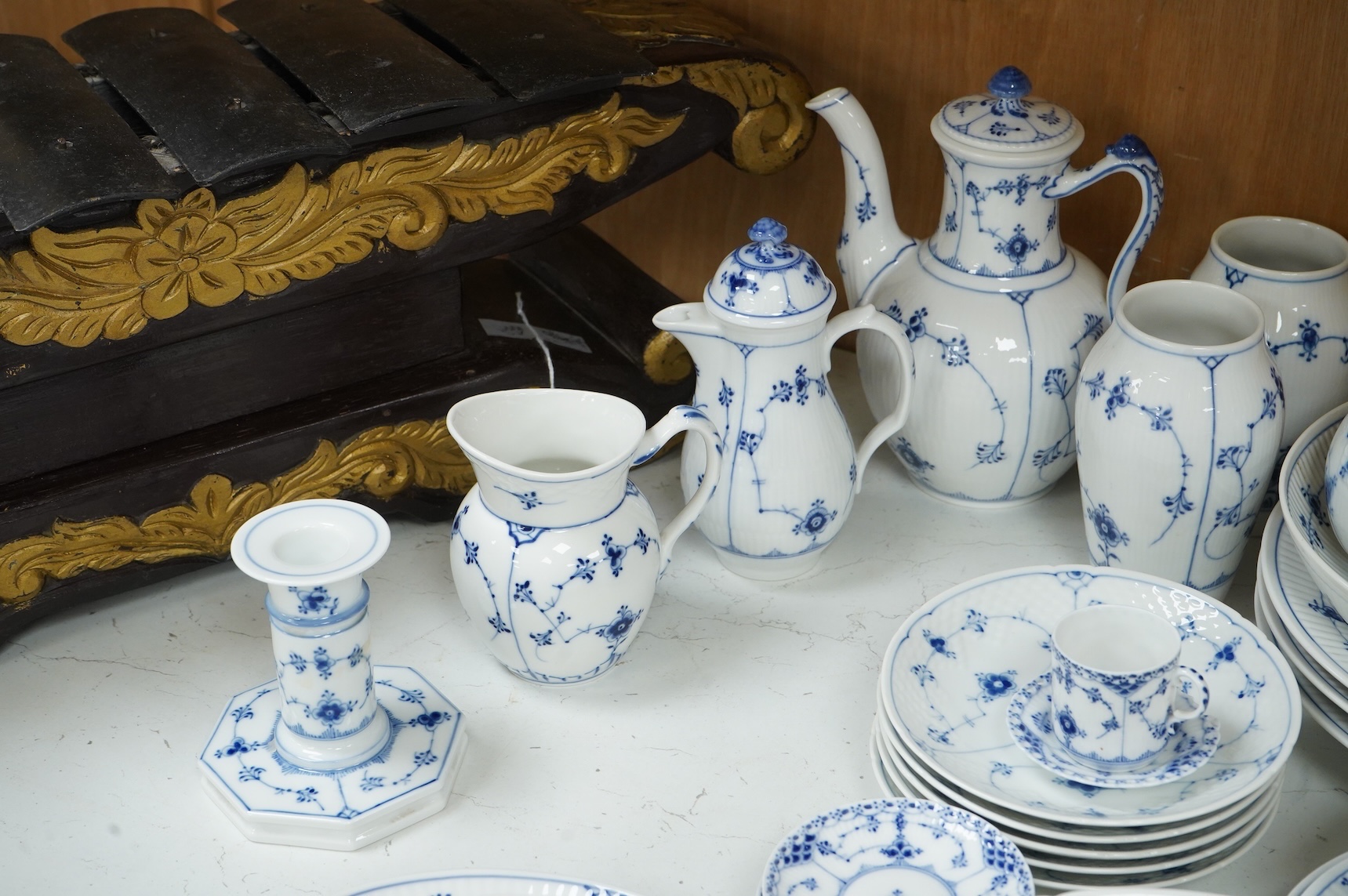 A collection of Royal Copenhagen and Bing & Grondahl onion pattern blue and white tableware